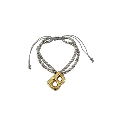 Pulsera con dije letra