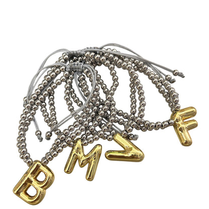 Pulsera con dije letra